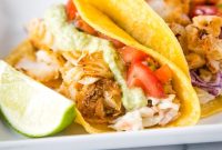 Crispy Baja Fish Tacos with Lime Crema and Cabbage Slaw