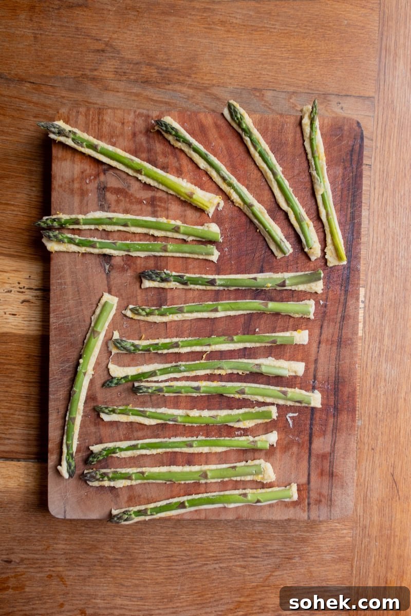 Asparagus Soldiers and Soft-Boiled Dippy Eggs: A Simple Brunch Recipe 3 Asparagus in Pastry - Georgie Mullen