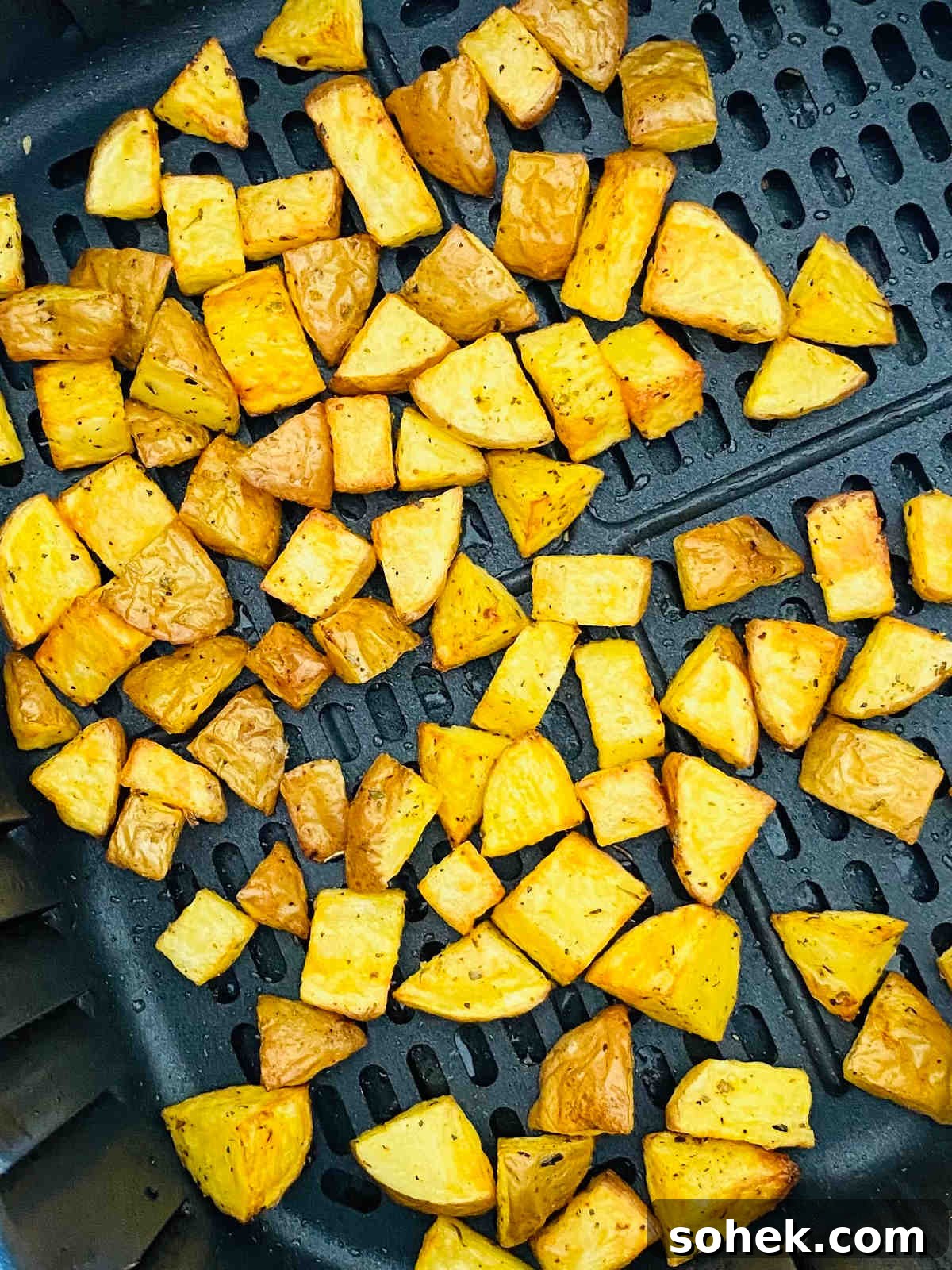 Crispy Air Fryer Diced Potatoes Recipe 5 cubed potatoes in air fryer basket