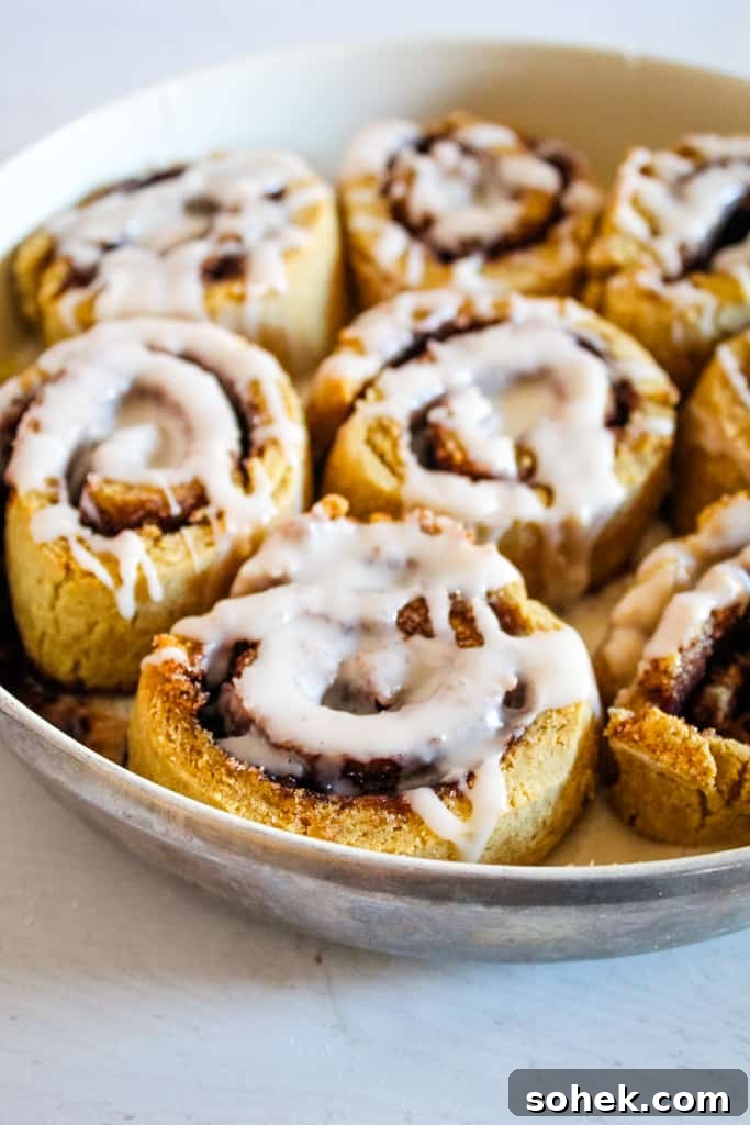 Soft, Gooey Gluten-Free Cinnamon Rolls Made Without Yeast 2 Gluten-free cinnamon rolls with icing