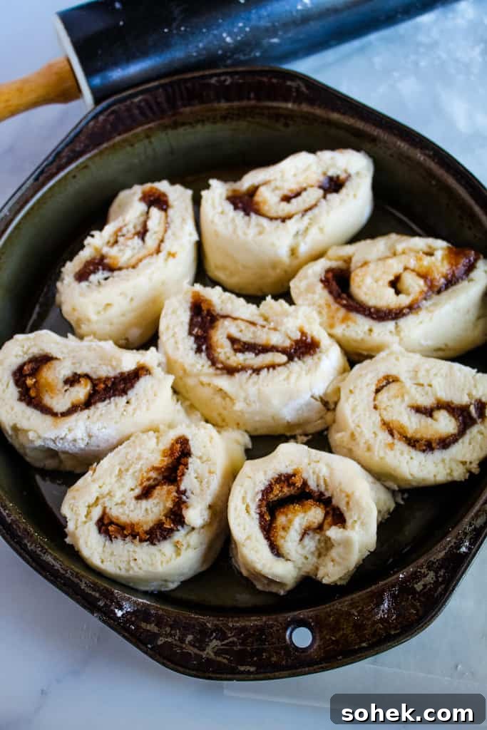 Soft, Gooey Gluten-Free Cinnamon Rolls Made Without Yeast 6 gluten free cinnamon rolls before baking