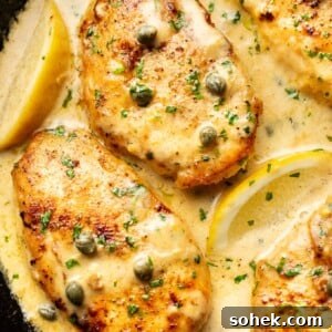 Classic Chicken Piccata Recipe – Tangy Lemon Capers Guide 7 close-up of chicken piccata in a cast iron skillet