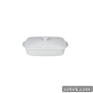 Creamy Cheddar Chicken Noodle Casserole Recipe 2 a white rectangular baking dish on a white background.
