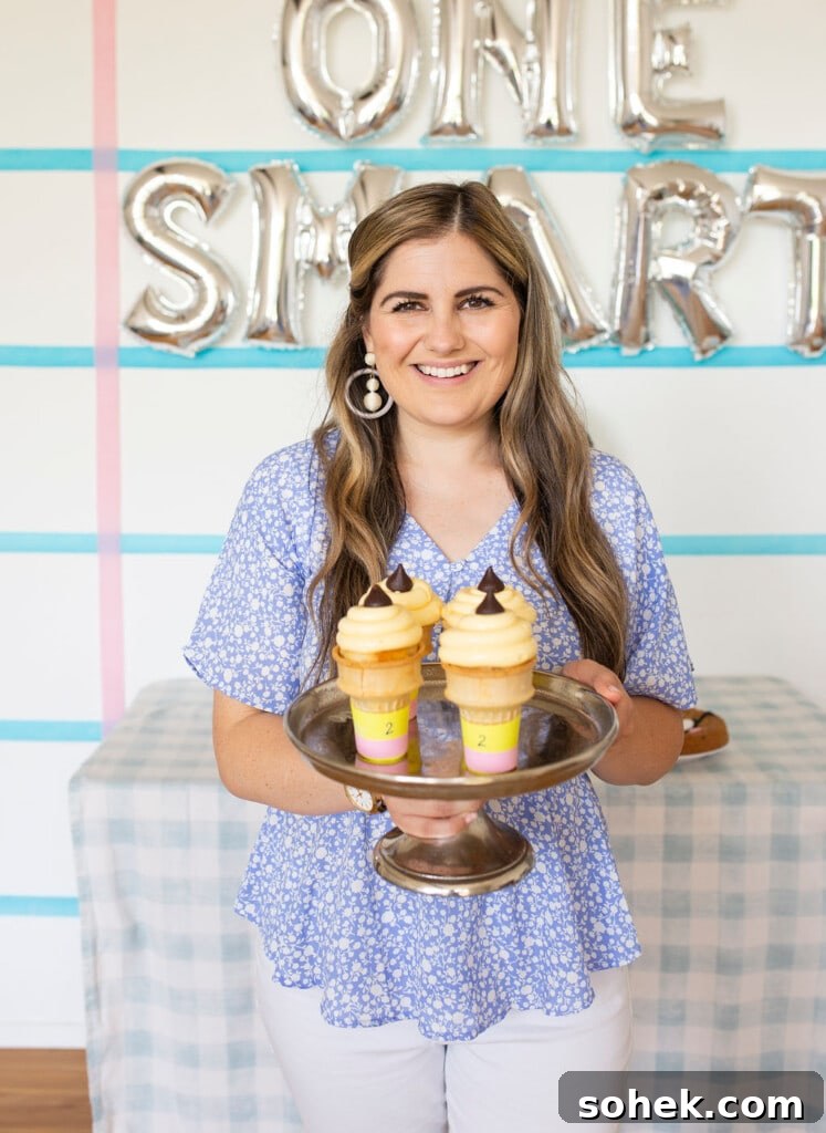 Smart Cookie Back-to-School Party Ideas for Kids and Parents 11 smiling woman holding pencil cupcakes
