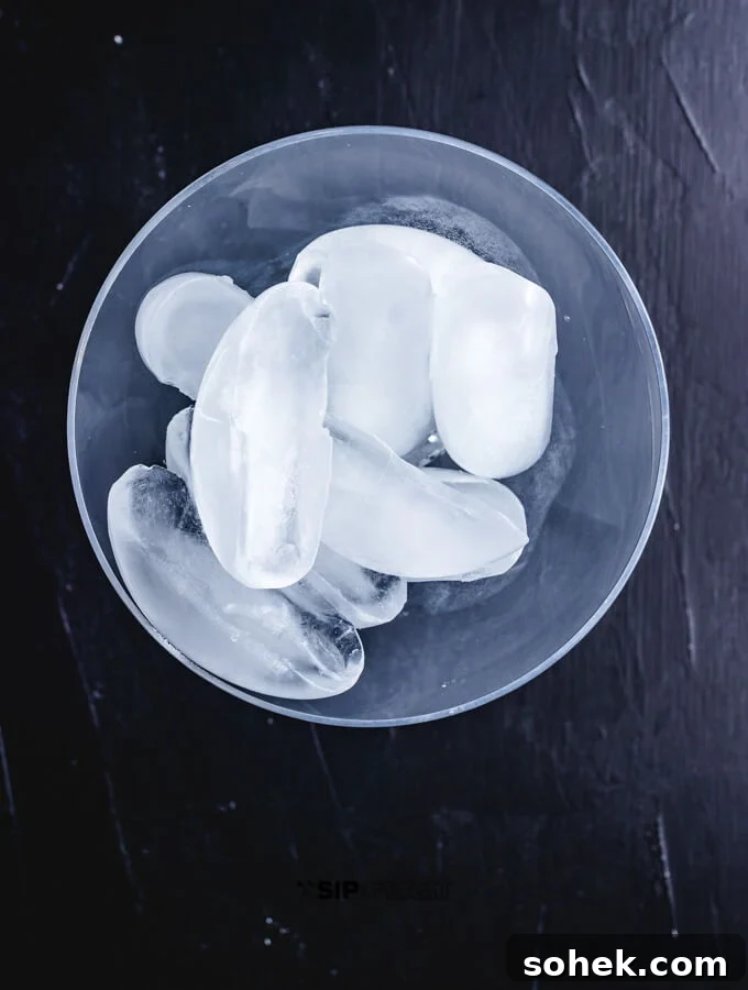 Ice place into the glass to chill it.