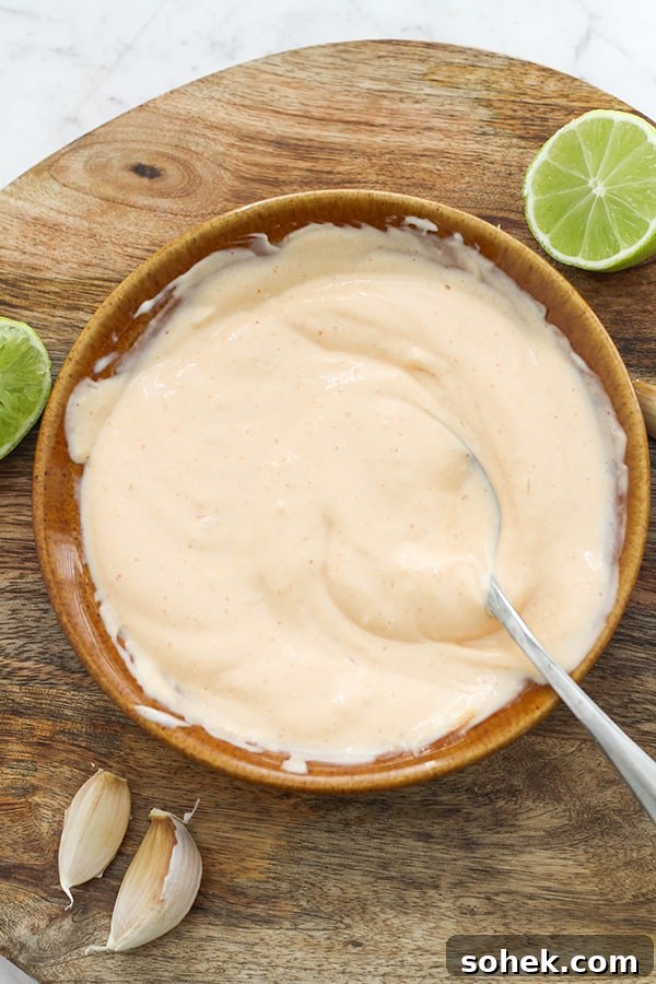 sriracha aioli in a brown bowl.