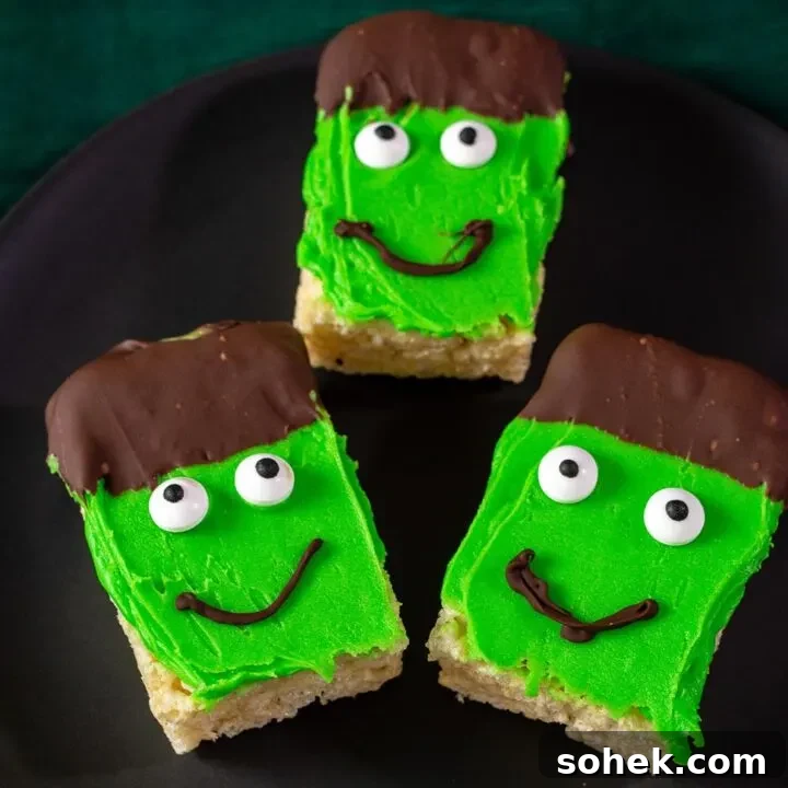 Three Frankenstein Crispy Cereal Treats on a black plate