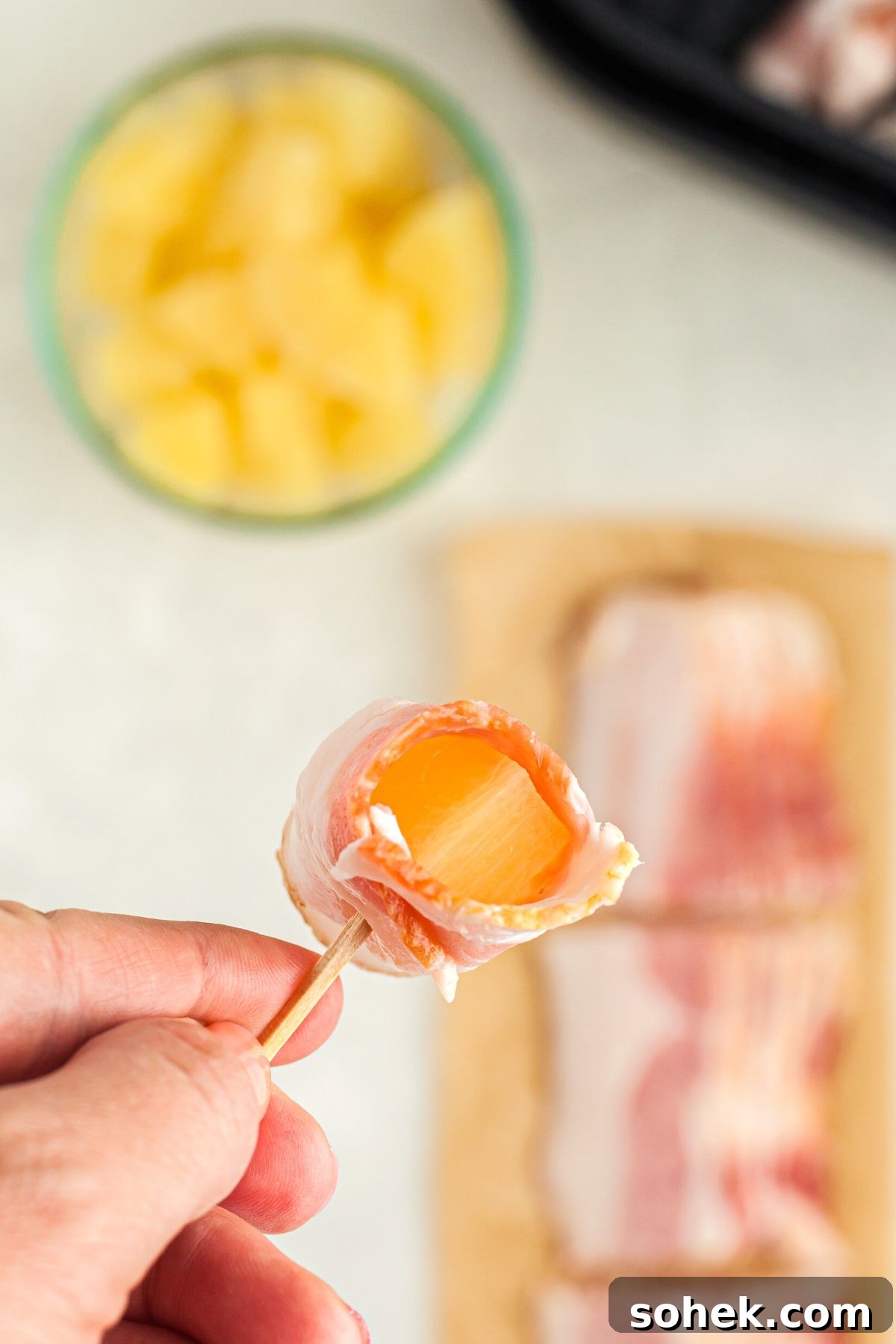 Crispy Air Fryer Bacon-Wrapped Pineapple Bites 5 One chunk of pineapple wrapped in a third slice of bacon, then secured with a toothpick