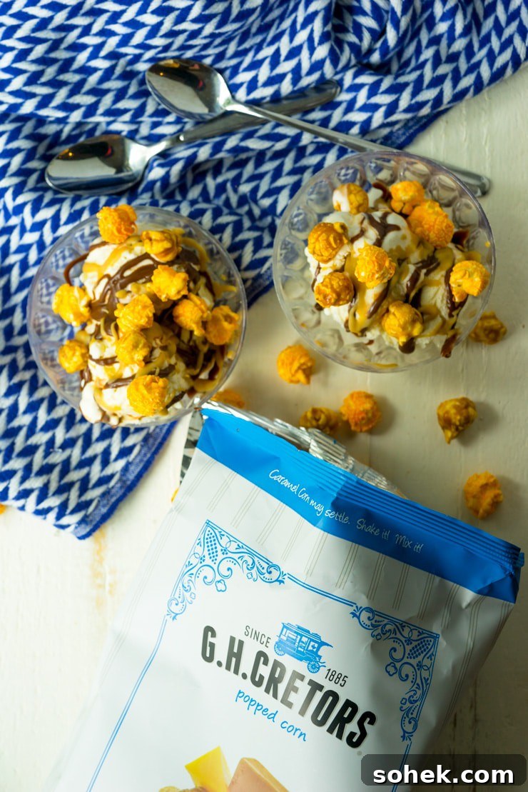 Sundae topped with Chicago mix popcorn Ice cream sundae with homemade hot fudge sauce, homemade butterscotch sauce and Chicago mix popcorn