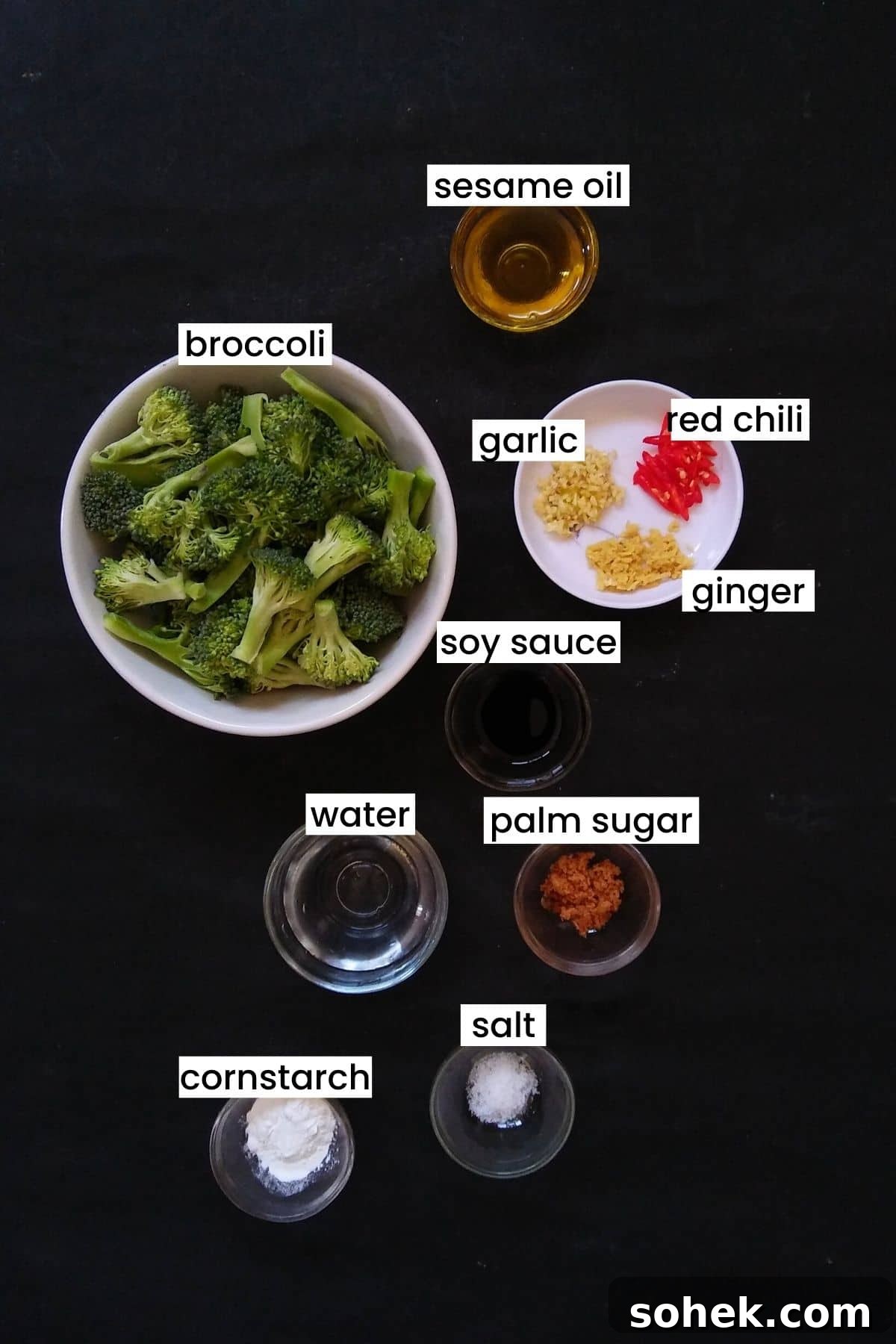 Flavorful Asian Broccoli Stir-Fry with Garlic and Soy Sauce 3 Image showing stir fried broccoli ingredients on a black background.
