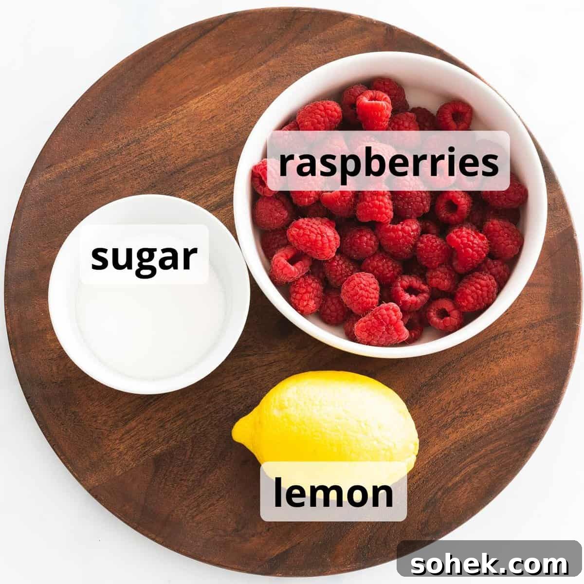 Homemade Raspberry Sauce Recipe for Desserts and Toppings 5 Ingredients for raspberry sauce with text overlay.