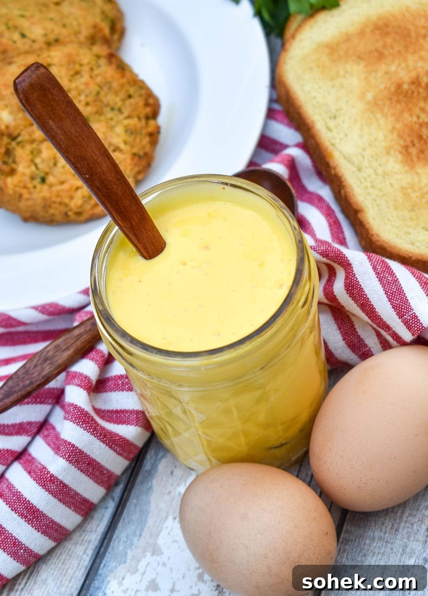Quick Blender Hollandaise Sauce Recipe for Perfect Creamy Results 2 blender hollandaise sauce in a small glass mason jar