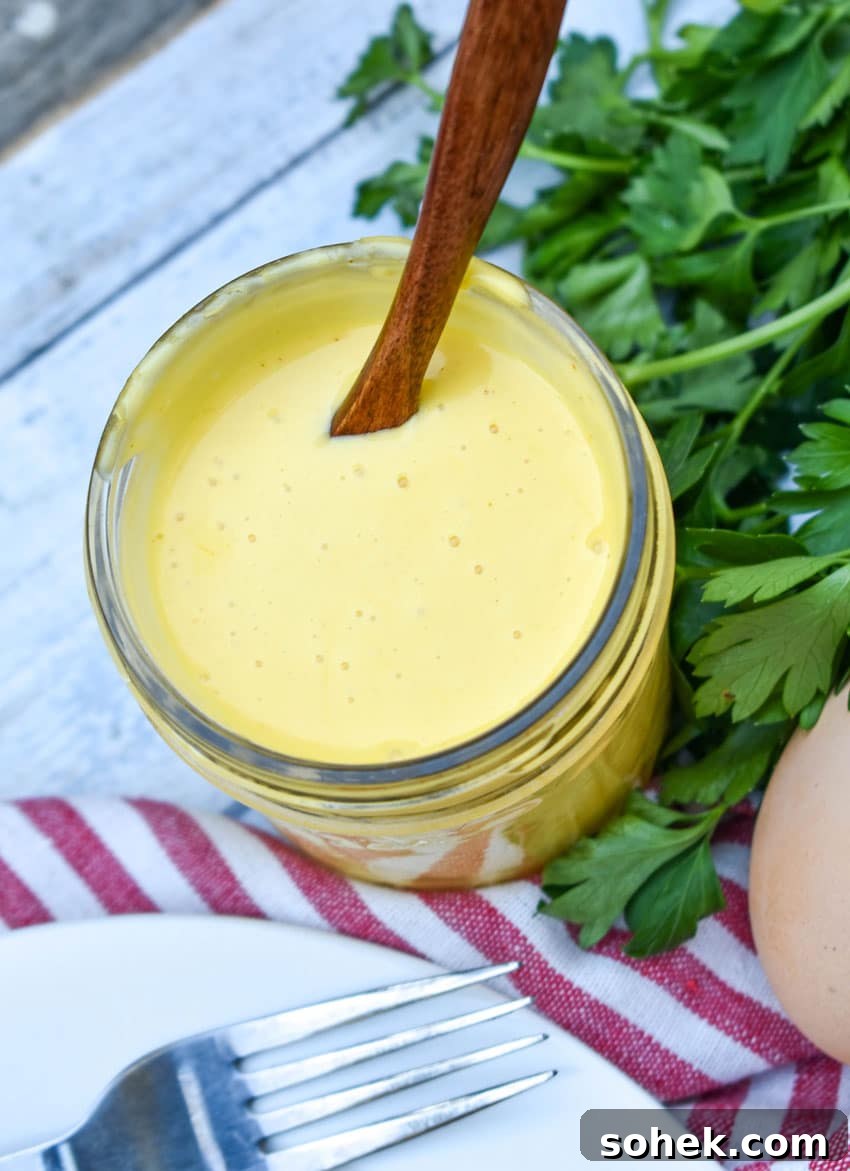Quick Blender Hollandaise Sauce Recipe for Perfect Creamy Results 5 blender hollandaise sauce in a small glass mason jar