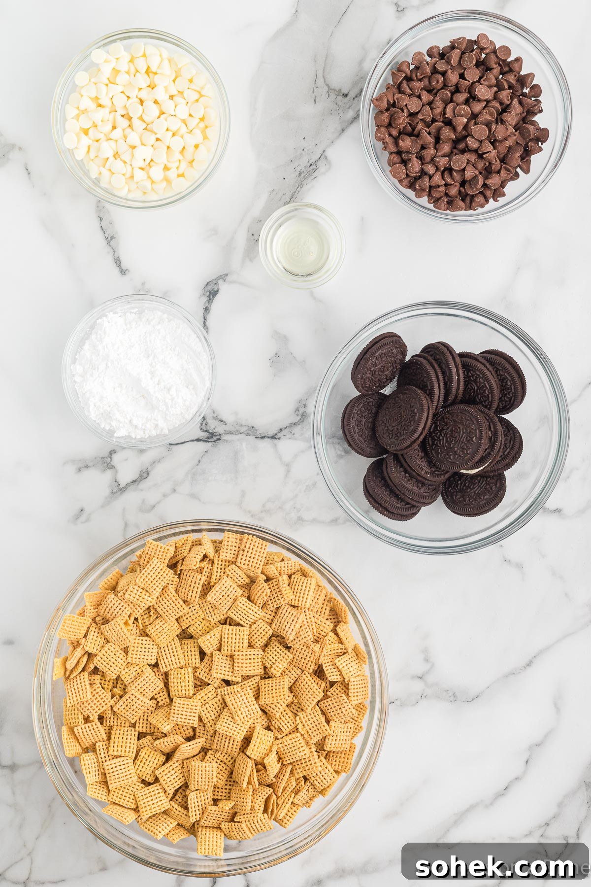 Oreo Puppy Chow Recipe: No-Bake Chocolate Cookie Snack 3 Ingredients for Oreo Puppy chow - chex cereal, oreos, powdered sugar, chocolate.