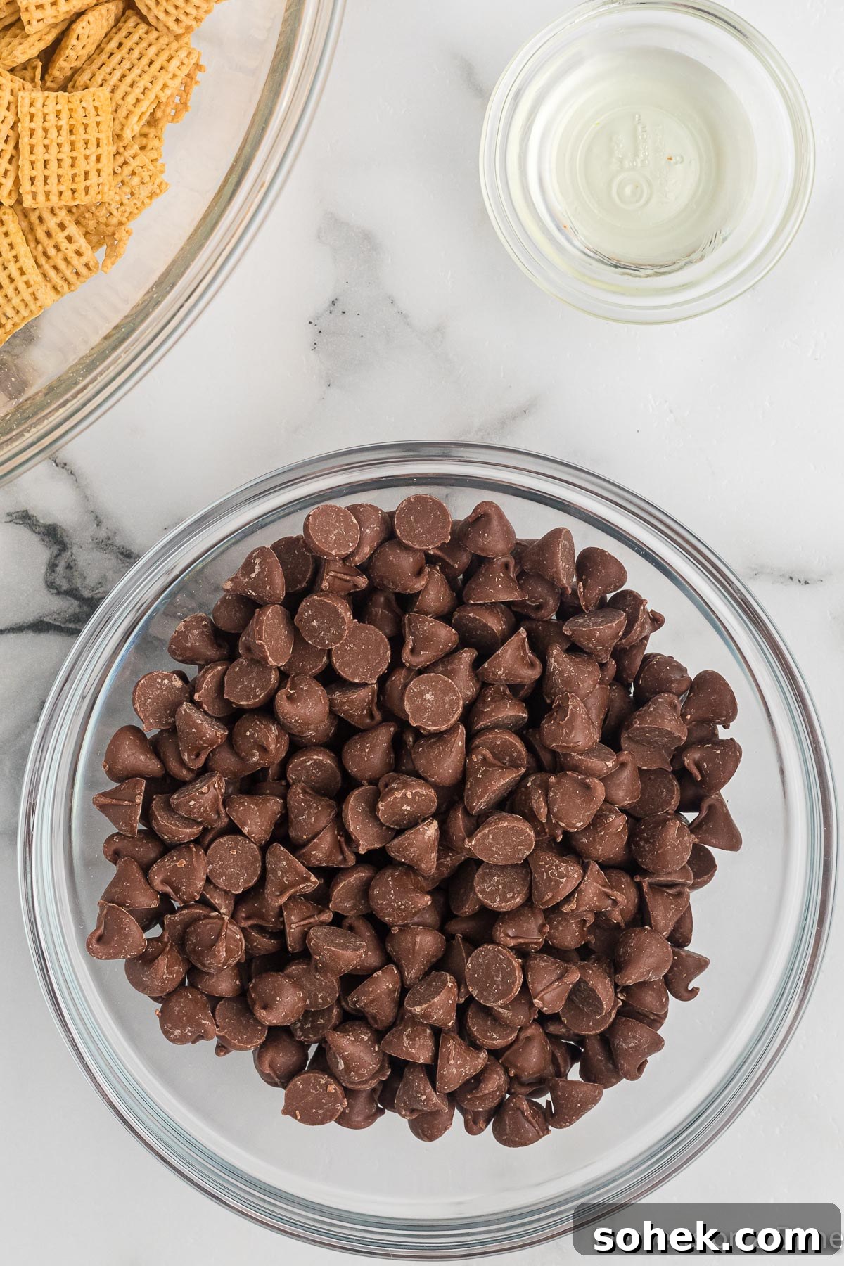 Oreo Puppy Chow Recipe: No-Bake Chocolate Cookie Snack 7 Milk chocolate chips in a bowl.