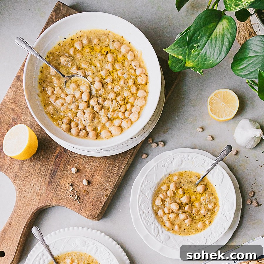 Square image of two bowls of Greek Chickpea soup