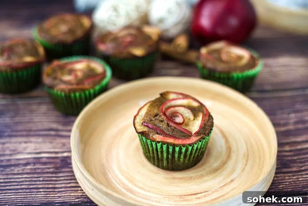 Strawberry Cream Cupcakes: Moist Vanilla Cupcakes with Fresh Strawberry Frosting 9 Apple cinnamon cupcakes arranged beautifully on a rustic wooden plate.