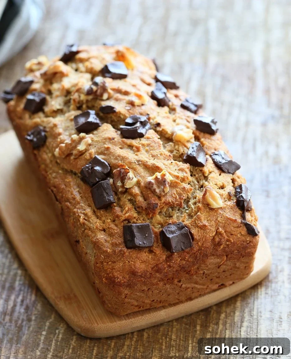Vegan Banana Bread with Walnuts. Classic super moist Banana bread with toasted nuts and coconut. No Palm oil. #Vegan #Recipe #veganricha | VeganRicha.com. 