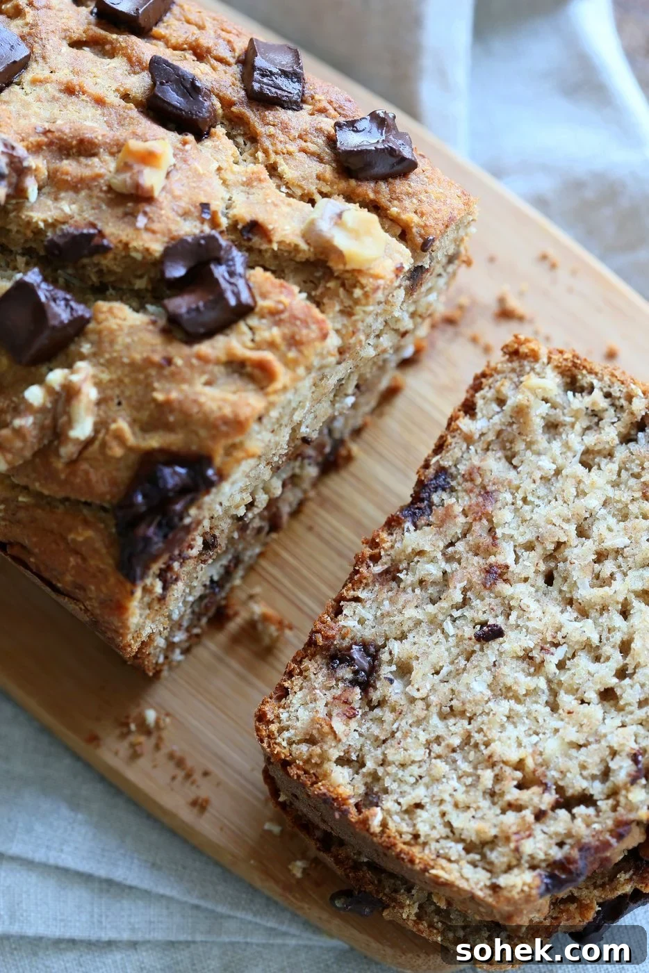 One-Bowl Vegan Banana Bread with Toasted Walnuts & Coconut 9 Vegan Banana Bread with Walnuts. Classic super moist Banana bread with toasted nuts and coconut. No Palm oil. #Vegan #Recipe #veganricha | VeganRicha.com.