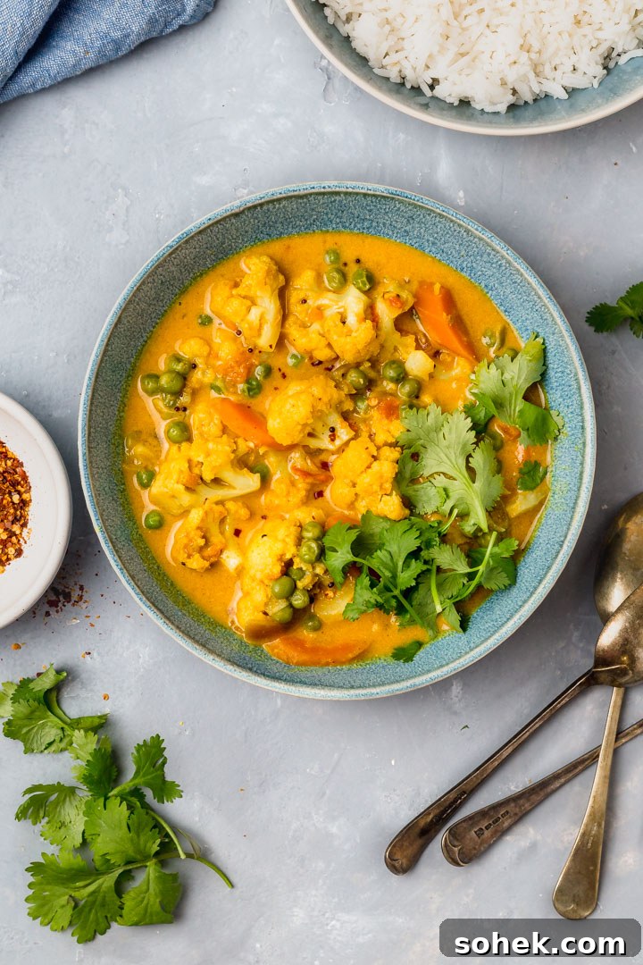 Instant Pot Cauliflower Coconut Curry Recipe for Quick Dinners 2 cauliflower coconut curry in a bowl with rice