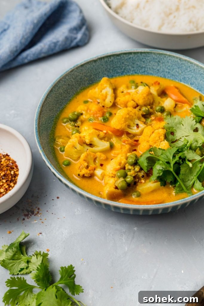 Instant Pot Cauliflower Coconut Curry Recipe for Quick Dinners 3 cauliflower coconut curry in a bowl with rice