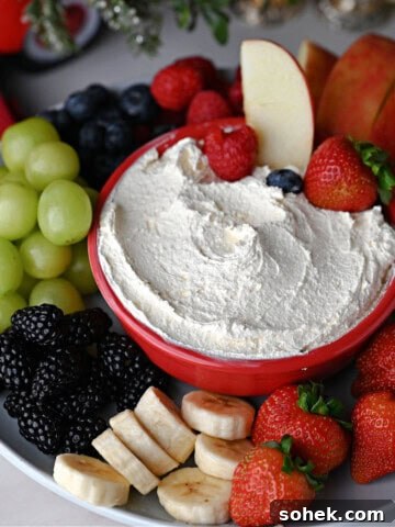 Cool Whip dip surrounded by dippable fruit.