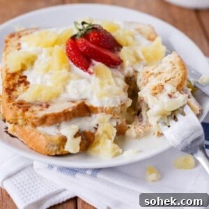 Pineapple Coconut French Toast Recipe — Piña Colada Flavor 9 Piña Colada French Toast on a plate