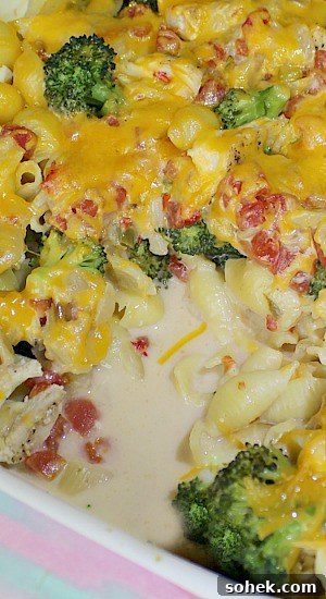 Try this Cheesy Chicken Casserole recipe using queso and cheddar cheeses, leftover chicken, and broccoli. Cheesy Chicken Casserole