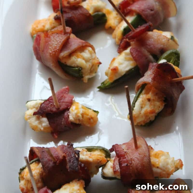 Bacon-Wrapped Jalapeños on a white platter