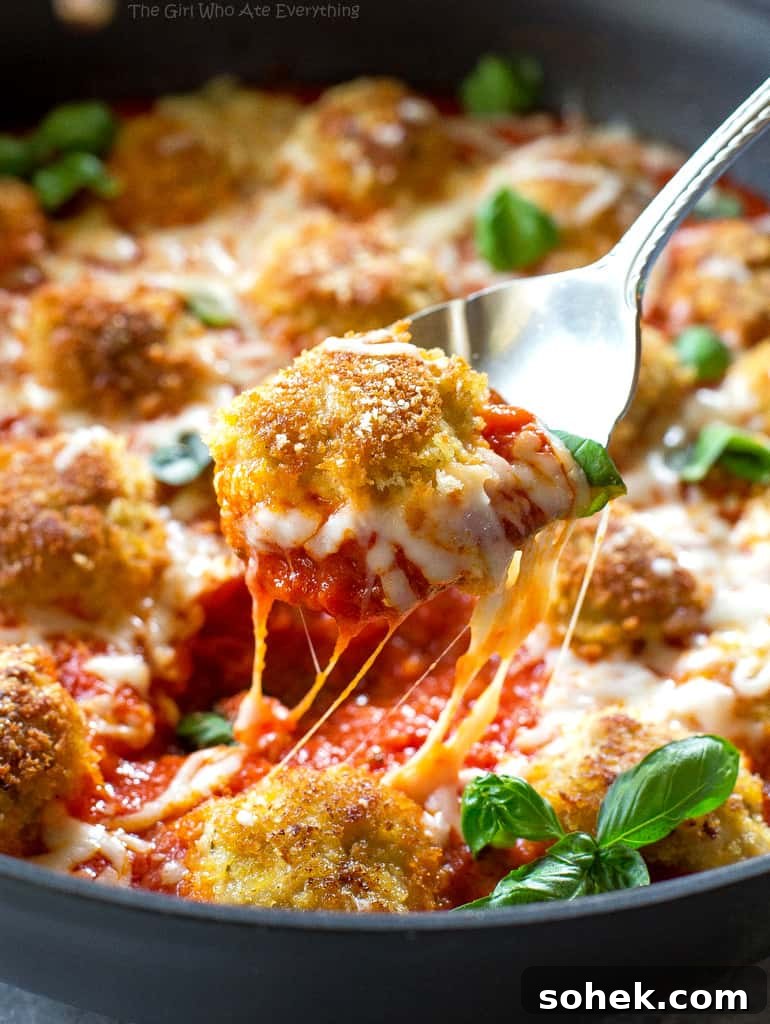 Chicken Parmesan Meatballs on a spoon