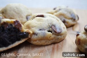 Oreo Truffle Stuffed Chocolate Chip Cookies are decadent oreo truffles encased in a soft and rich chocolate chip cookie.