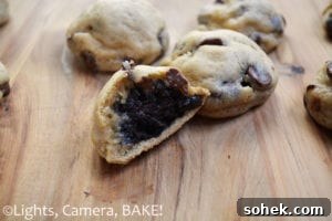 Oreo Truffle Stuffed Chocolate Chip Cookies are decadent oreo truffles encased in a soft and rich chocolate chip cookie.