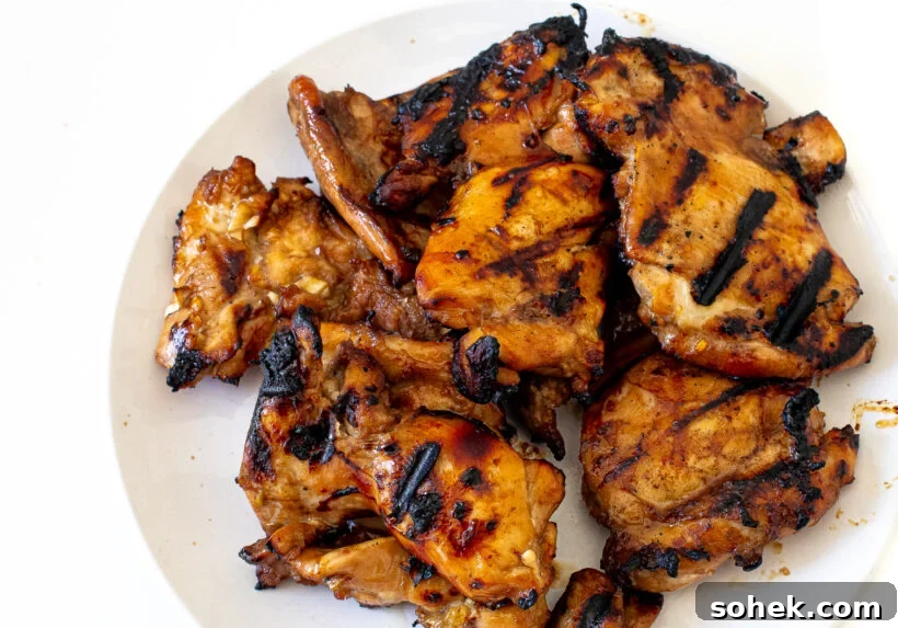 Honey-Lime Grilled Chicken with Sweet Citrus Glaze 5 Grilled honey lime chicken breasts on a plate.