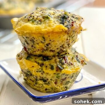 2 quinoa egg muffins stacked on top of each other.