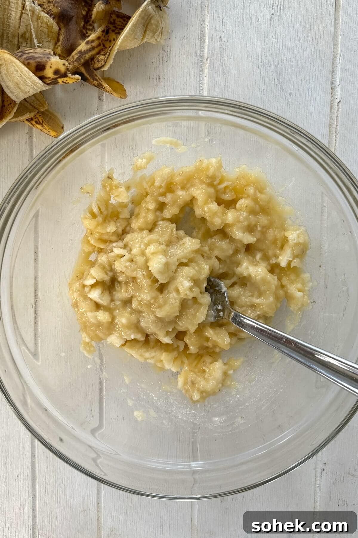 Fluffy Banana and Cottage Cheese Pancakes for Protein-Packed Breakfast 5 Mashed bananas in a bowl.