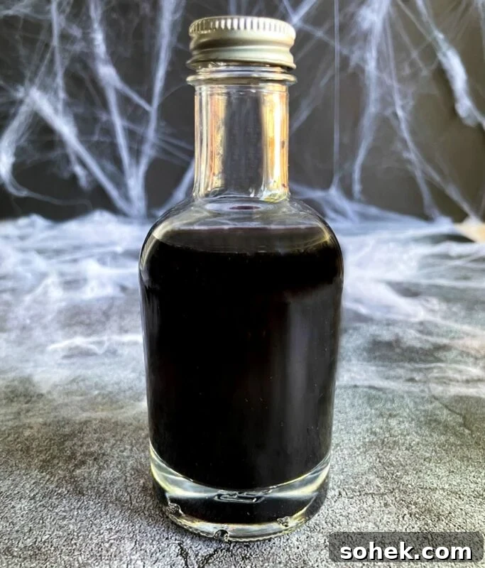Black Vodka: What It Is, How It's Made, and How to Drink It 2 black vodka in a glass bottle.