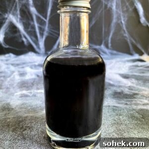 Black Vodka: What It Is, How It's Made, and How to Drink It 8 black vodka in a glass bottle.