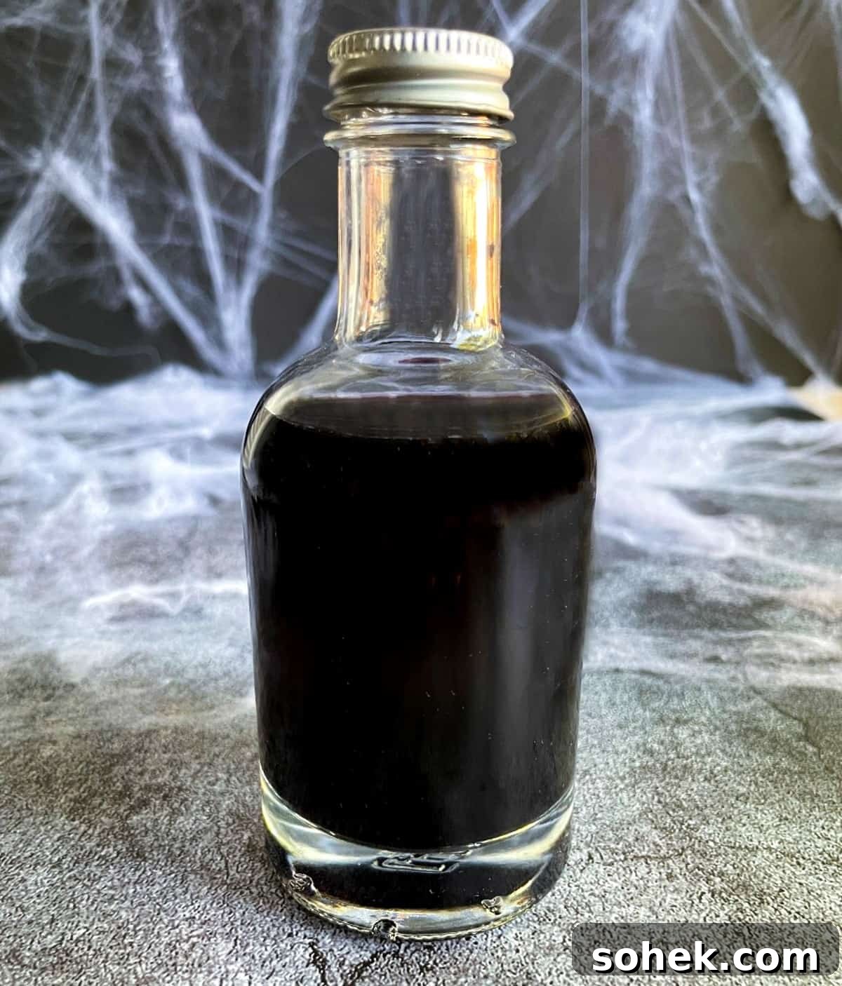 Black Vodka: What It Is, How It's Made, and How to Drink It 5 black vodka in a glass bottle.