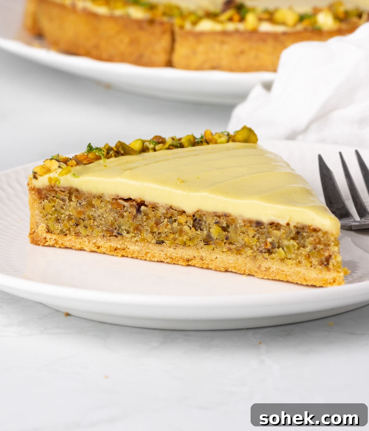 One slice on a small white plate.