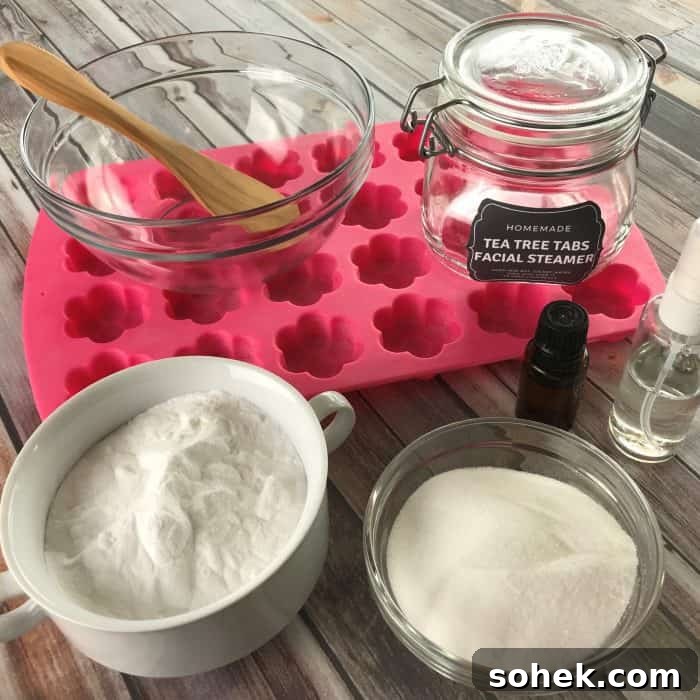 Tea Tree Acne Facial Tabs — Lush-Inspired Acne Treatment 3 essential oil facial steamer tea tree tabs ingredients in bowls, flower-shaped silicone mold, clear jar with tea tree tabs facial steamer label, essential oil bottle, squirt bottle