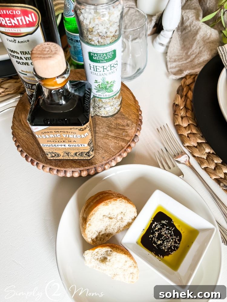 Stunning Italian Dinner Party Menu Ideas to Impress Your Guests 11 Bread on plate with a seasoned oil and vinegar dipping dish. Wooden stand with oil, vinegar, and salt