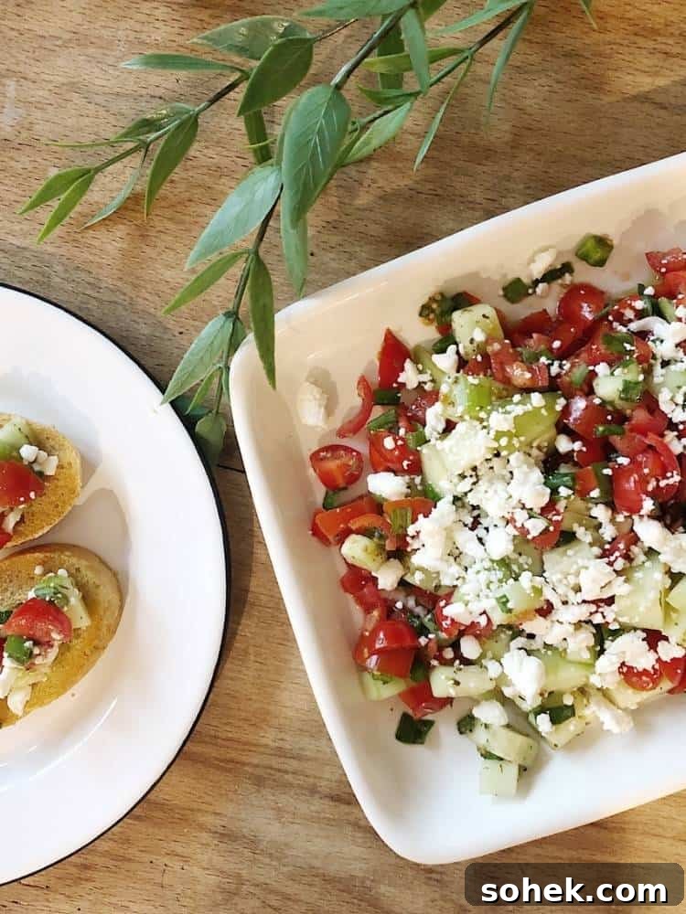 Stunning Italian Dinner Party Menu Ideas to Impress Your Guests 4 Serving dish of Italian bruschetta topping next to a plate of crostini with the topping on a wood table for an Italian dinner