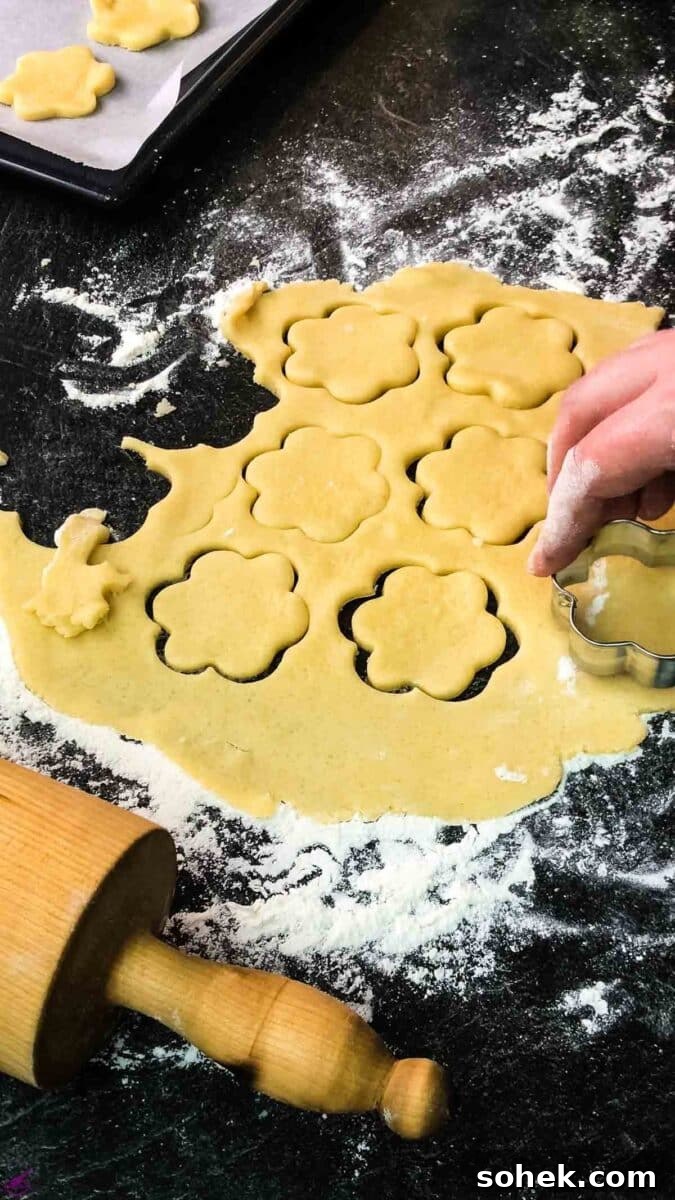 No-Chill Cut-Out Sugar Cookies Recipe — Soft, Ready-to-Roll 4 Flower shape cut out sugar dough.