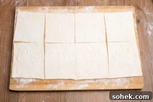 Greggs-Style Steak Bake Recipe: How to Make It at Home 13 A puff pastry sheet cut into eight equal size squares