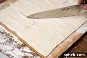 Greggs-Style Steak Bake Recipe: How to Make It at Home 14 Scoring the puff pastry squares using a Sharpe knife