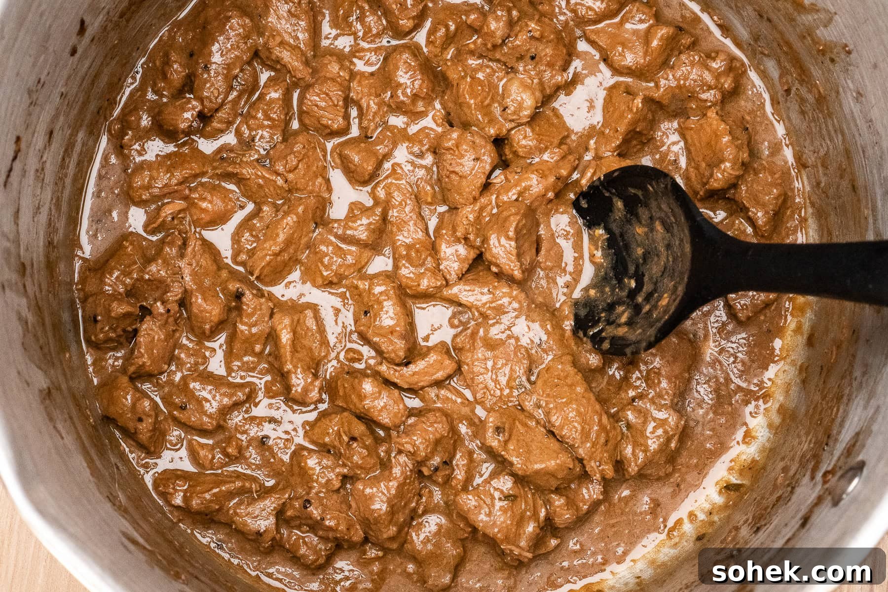 Greggs-Style Steak Bake Recipe: How to Make It at Home 30 Cooling down the steak bake filling in a large silver pot