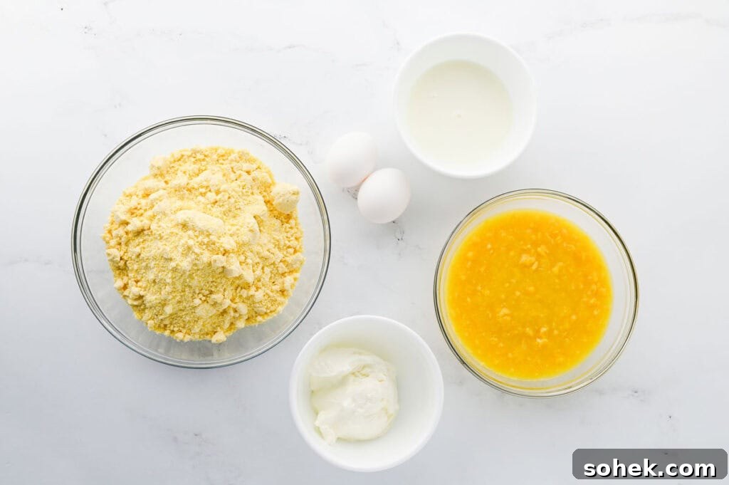 cornbread muffin ingredients in bowls on counter