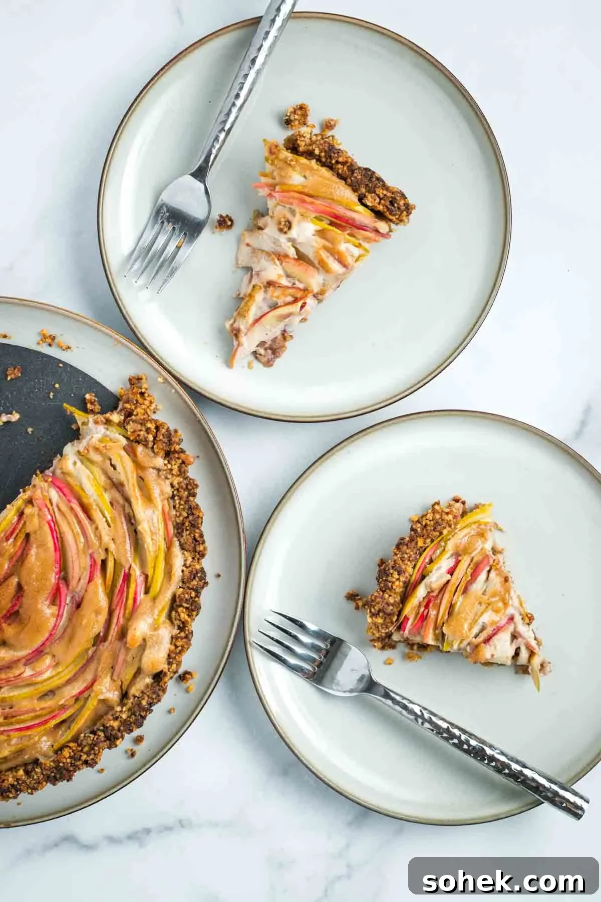 Apple Walnut Tart with Creamy Vegan Cashew Custard Recipe 2 Slices of apple tart with vegan custard and walnut date crust.