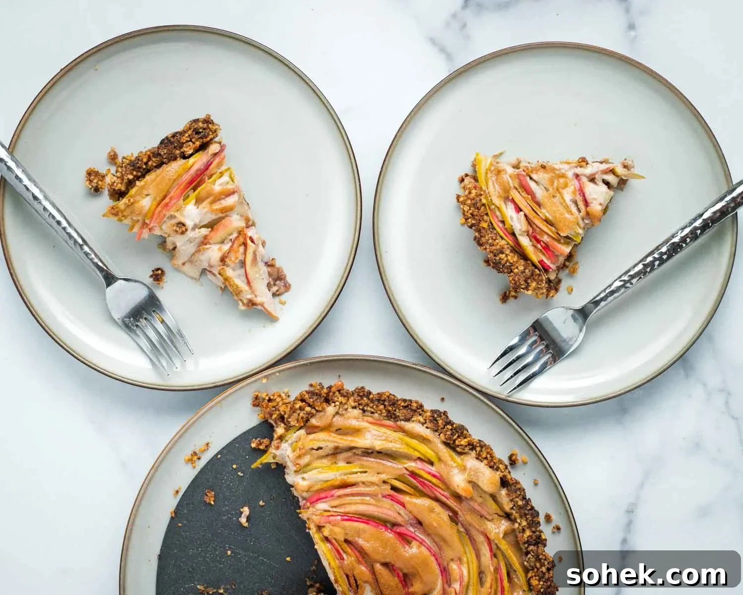 Apple Walnut Tart with Creamy Vegan Cashew Custard Recipe 20 2 plates with slices of apple walnut custard tart.