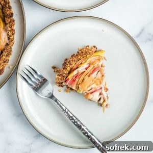 Apple Walnut Tart with Creamy Vegan Cashew Custard Recipe 21 Slices of apple in a custard on top of a walnut tart crust.